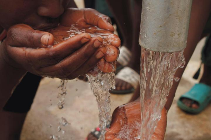 Children drinking water.