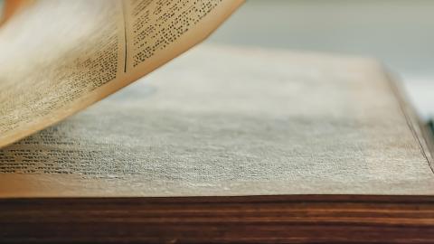 Image of a page turning in a book