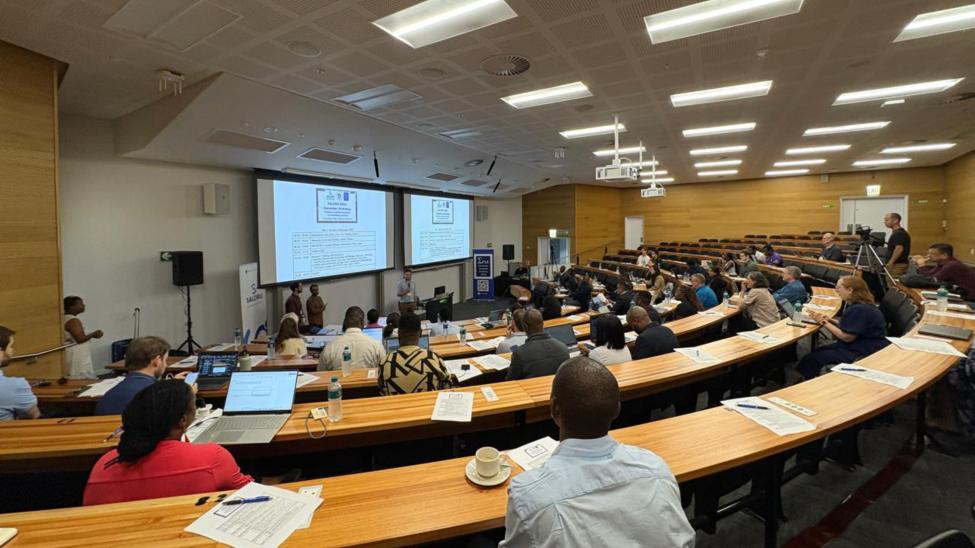 Attendees in the venue where presentations were held at the December Workshop.