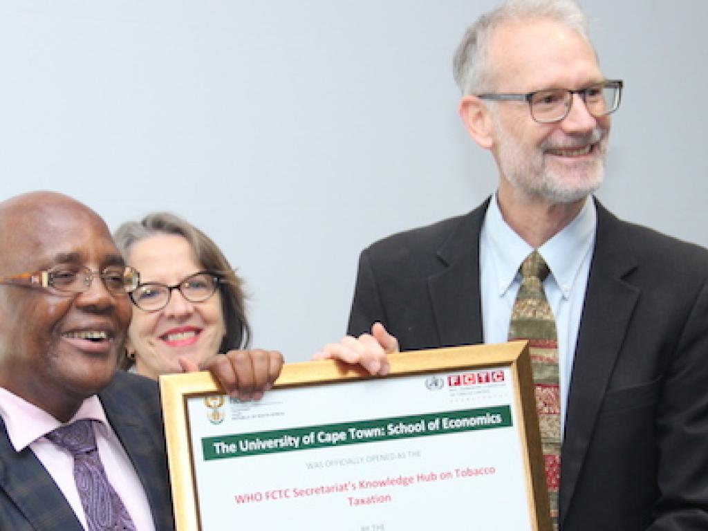 South Africa’s Minister of Health, Dr. Aaron Motsoaledi at the launch of the WHO FCTC Knowledge Hub on Tobacco Taxation, pictured with the Head of the Convention Secretariat WHO FCTC, Vera Luiza da Costa e Silva and SALDRU’s director, Prof. Murray Leibbrandt.
